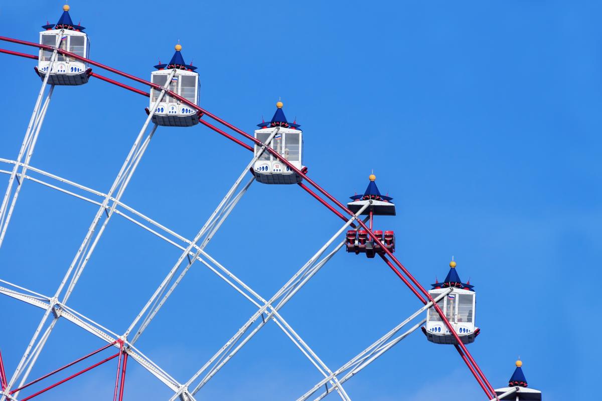 ferris wheel against a blue sky