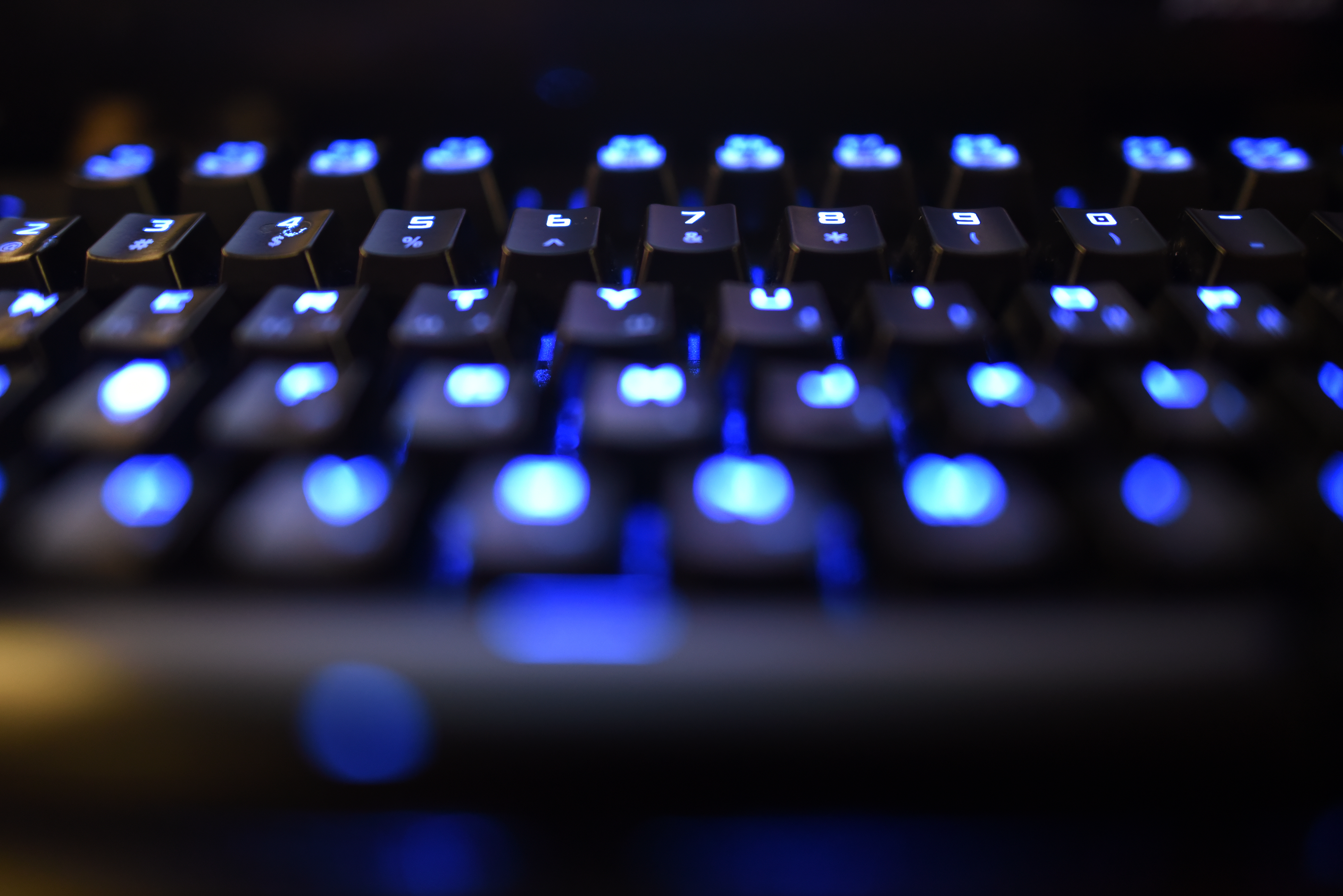 computer keyboard in shadow