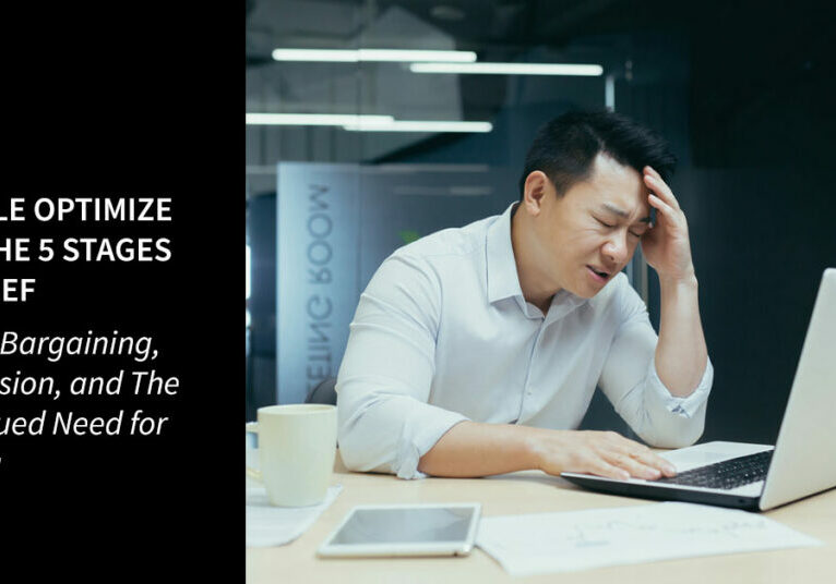 Concerned asian businessman at laptop
