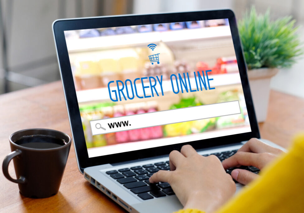 Grocery online shop to order food delivery from supermarket, Woman hands using laptop computer for shopping grocery store online, electronic marketing, e commerce business concept